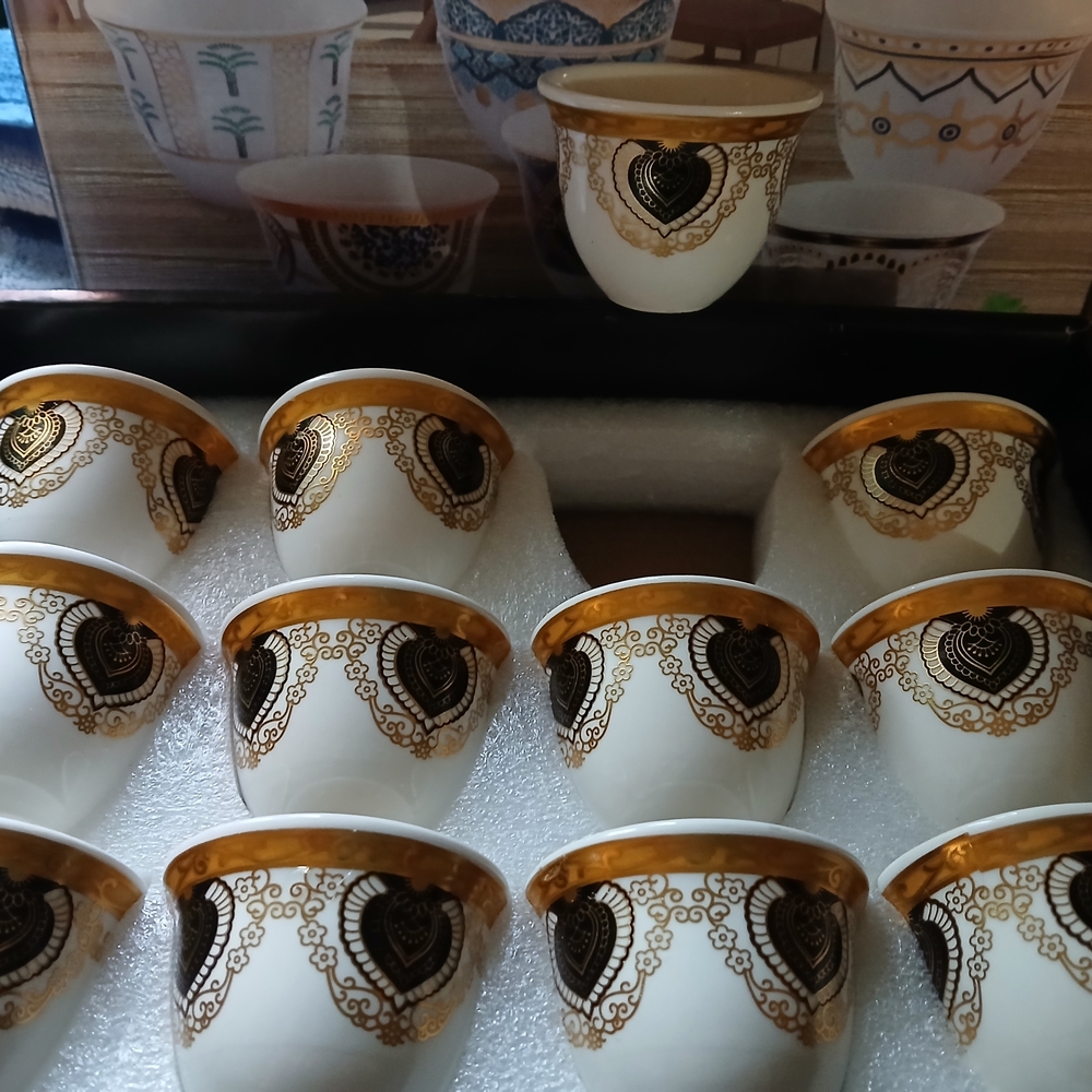 Elegant Gold and White Tea Cups Set
